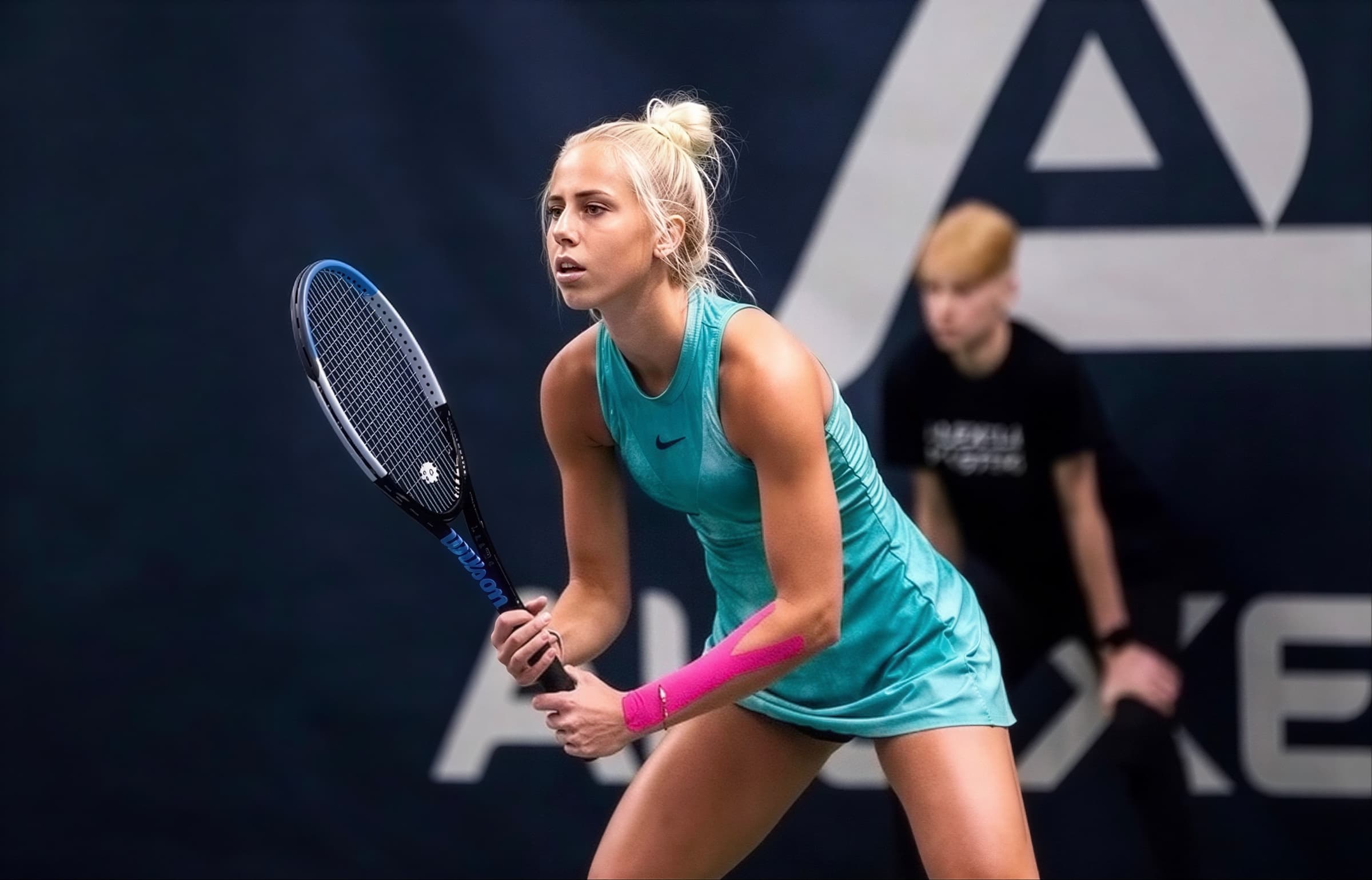 Lissi Kubre playing competitive tennis